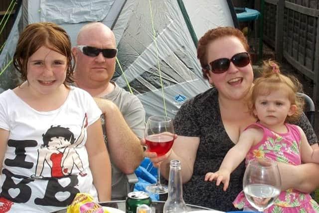 Lindsey Gates with her husband Jason and children Brooke and Charley
