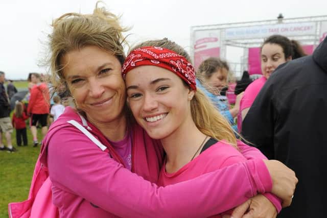 From left, Lynn Saunders running for her late father John, with her daughter Ella Saunders (160710-5498)
