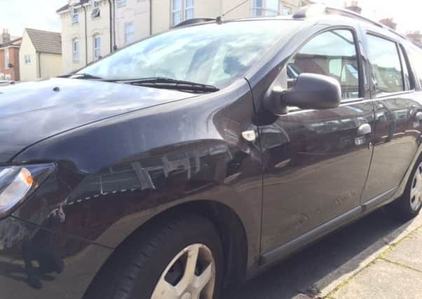 A scratched Dacia Logan MCV, one of over 100 cars targeted by a vandal in Queen Street, Buckland, Portsmouth