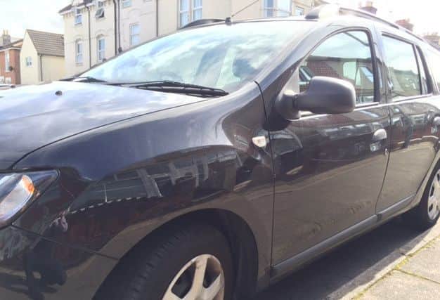 A scratched Dacia Logan MCV, one of over 100 cars targeted by a vandal in Queen Street, Buckland, Portsmouth