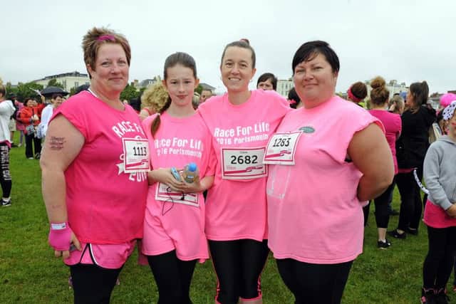 RACE FOR LIFE 2016                                                   MRW   10/7/2016 The 5K Race for Life on Southsea Common on Sunday morning Looked after by new friends ! - (centre) Mollie Downie (11) and her mum Claire Downie (38) from PaulsgroveFather and husband Paul Downie died at the age of 51 after just 5 weeks from being diagnosed with cancer in his stomach, liver and lungsNew friends (left) Nina Churchill (42) and (right) Jo Thompson (37)Picture by:  Malcolm Wells (160710-5532)Professional Photographer Mobile: 07802 217 569E: malcolmrichardwells@gmail.com PPP-161007-165501006