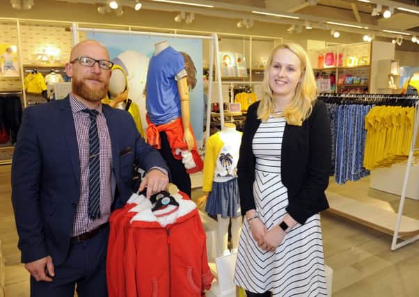 Manager Lincoln Ashley with deputy manager Sophie Thomas in the new store