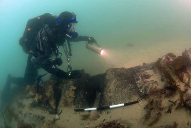 A diver examines the wreck of Invincible on the Solent seabed Picture: Michael Pitts