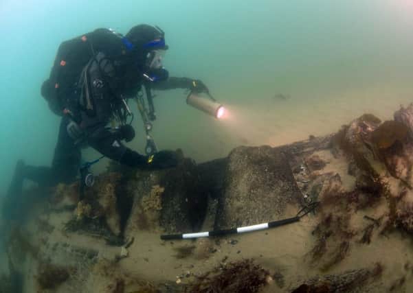 A diver examines the wreck of Invincible on the Solent seabed Picture: Michael Pitts