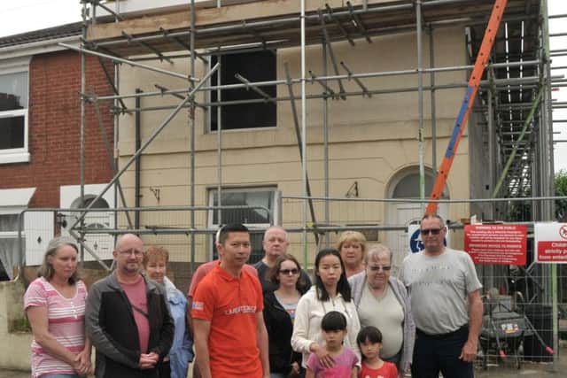 Residents in front of the property in Alver Road causing problems for neighbours
Picture: Mick Young