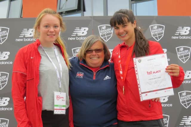 Serena Vincent, right, with club-mate Sarah Hunt, left, and coach Bronwin Carter