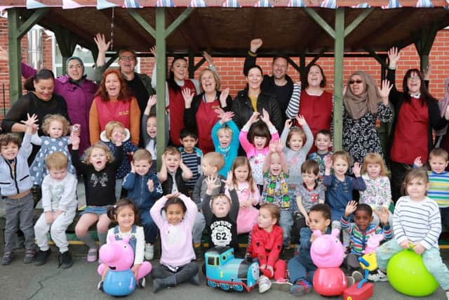 Jack and Jill Pre-school staff, helpers and children with Emma Costello and Iain Morgan from Bladez Toyz
