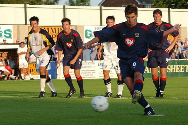 Mark Burchill scores from the penalty spot in 2003