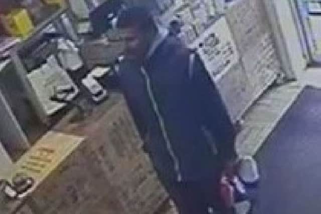 CCTV footage of the suspect police are looking for following the raid at All About Tea, in Somerstown.