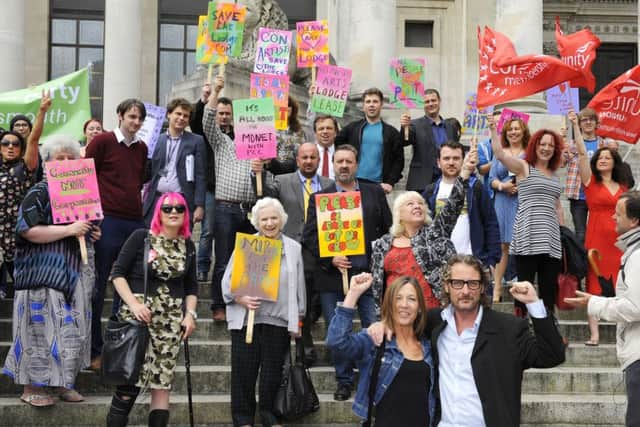 Save The Lodge supporters on the steps of Portsmouth Guildhall. Front bottom right, Alison Brett with owner Mark Lewis 								                                       Picture by: Malcolm Wells (160712-5982)