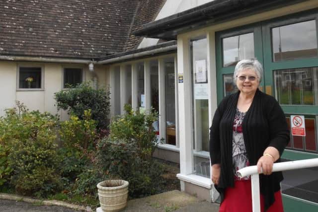 Churchwarden Cathy Stevens outside St Albans Church, West Leigh