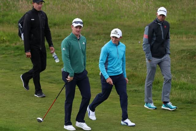 Justin Rose, left, and Scott Gregory during practice at Royal Troon Golf Cllub. Picture: Peter Byrne/PA Wire.