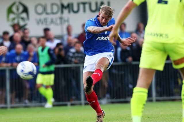 Carl Baker fires home his first goal. Picture: Joe Pepler
