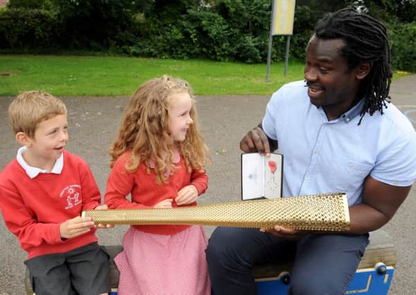Pupils Ollie Jenner and Daisy De-Saint-Bissix-Croix with Linvoy Primus
Picture: Sarah Standing (160934-5976)