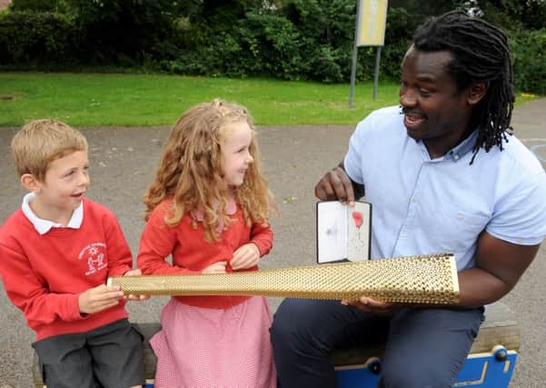 Pupils Ollie Jenner and Daisy De-Saint-Bissix-Croix with Linvoy Primus

Picture: Sarah Standing (160934-5976)
