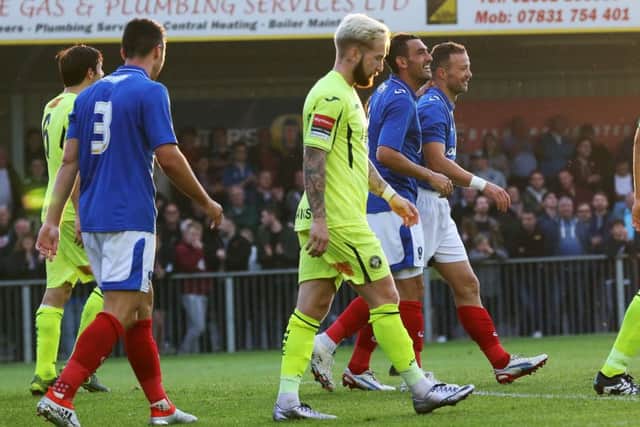 Noel Hunt celebrates his goal against the Hawks. Picture: Joe Pepler