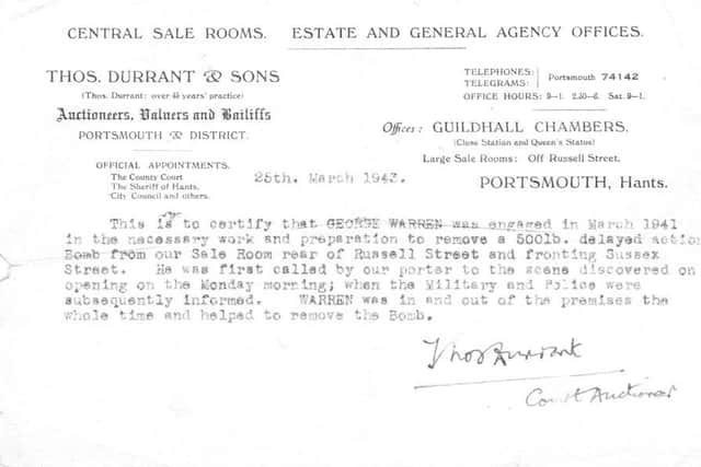 BOMB A letter commending George Warrens bravery in helping to remove a 500lb German bomb from the sale room of an estate agency in Sussex Street