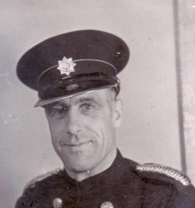 BRAVE A portrait of George Warren Snr which his son believes might have been taken when he was made a section leader with Portsmouth National Fire Service.