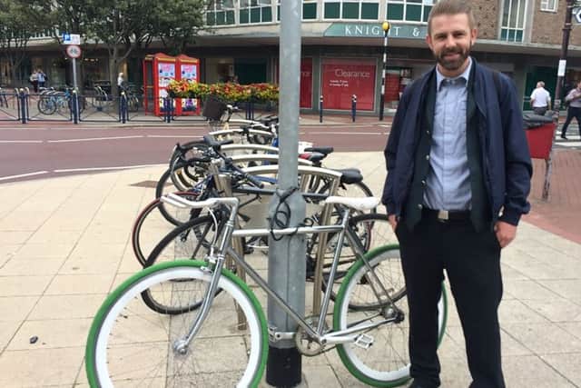 Brendan Hughes with his bike that had been stolen