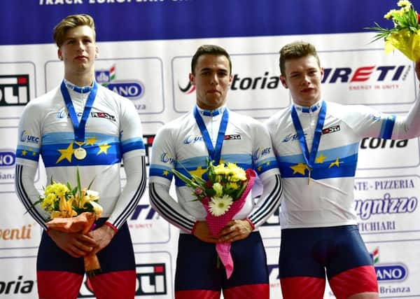 Joe Truman, left, with Ryan Owens and Jack Carlin, right. Picture: British Cycling