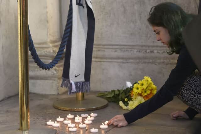 Candles are lit outside the French Embassy in London, following the death of at least 84 people, including several children, after a terrorist drove a truck through crowds celebrating Bastille Day in Nice. 
Picture: Hannah McKay/PA Wire