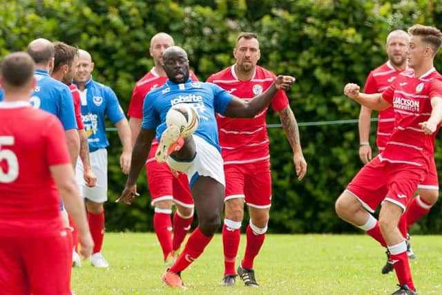 Former Pompey striker Patrick Agyemang in action during the memorial day for Jon Hankey Picture Credit: Keith Woodland