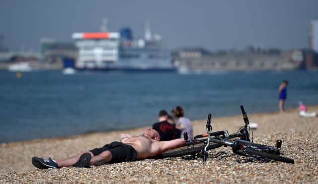 Sunbathers lapping up the sunshine at Southsea     Picture: Andrew Matthews/PA Wire