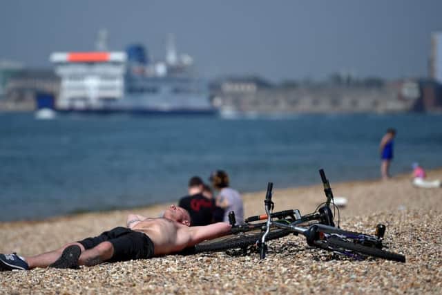 Sunbathers lapping up the sunshine at Southsea     Picture: Andrew Matthews/PA Wire