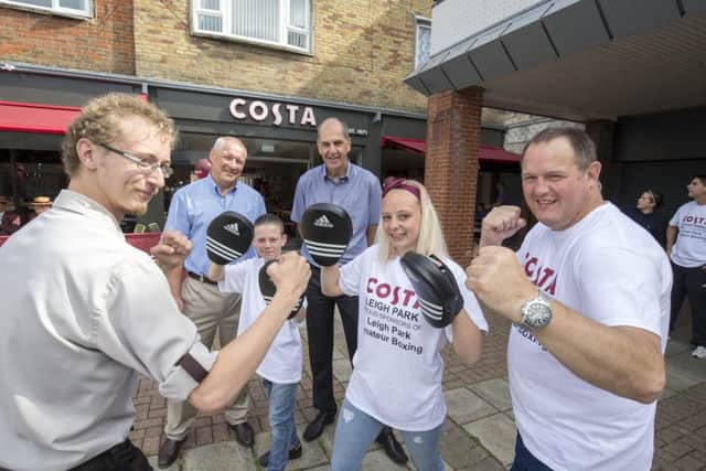 Store manager Aidan Kelly with Bobbi Clarke, Luke Booth and head coach Peter Vince , and Premier Coffee directors Robin Arkle and Andy Hirst at the new Leigh Park Costa