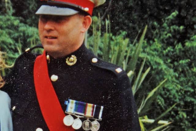 Former Royal Marine Stephen Parslow with his wife Candy and daughter Maisie on his wedding day