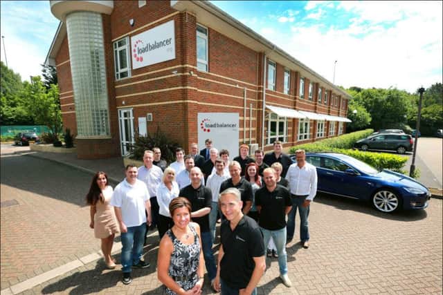 The Loadbalancer.org team outside their new £1.4m home at Compass House, Portsmouth Picture: Deep South Media