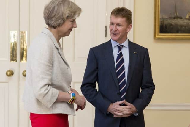 Prime Minister Theresa May speaks to astronaut Tim Peake