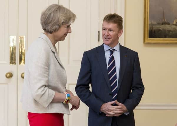 Prime Minister Theresa May speaks to astronaut Tim Peake
