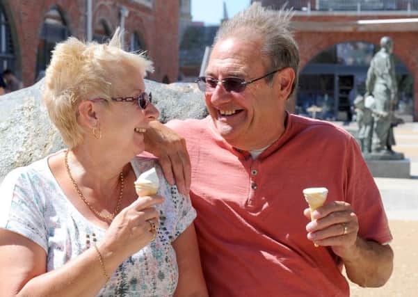 Joan Smith and her husband Jim from Waterlooville, enjoying an ice cream in the sunshine
Picture: Sarah Standing (161038-3571)