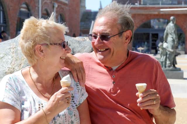 Joan Smith and her husband Jim from Waterlooville, enjoying an ice cream in the sunshine
Picture: Sarah Standing (161038-3571)