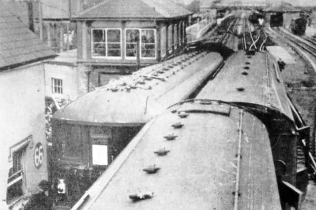 The trains came to rest against Havant signal box. The Brighton train is on the left.