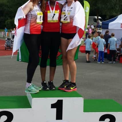 Gaia Osborne, right, on the podium in Kent