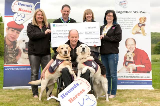 Pets at Homes Groom Room has given more than Â£35,000 to support two Hounds for Heroes trainee assistance dogs