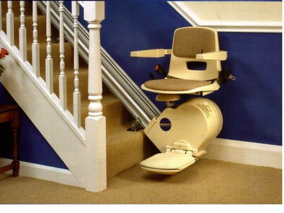 The cost of home improvements - including stairlifts - is at the centre of a Â£2m row between two councils