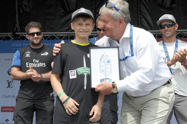 Sir Keith Mills with Zak Kay, 10, who designed the trophy.  Picture: Paul Jacobs (160264-20)