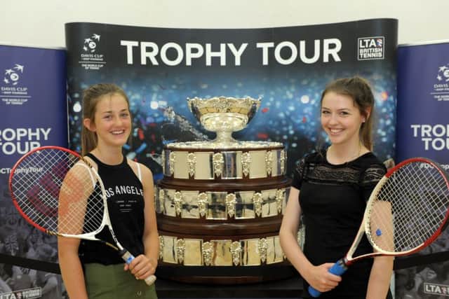 Carla Trainor, 13, left, and Isabella Jones, 15 with the Davis Cup at The Avenue Lawn Tennis, Squash and Fitness Club in Havant Picture: Paul Jacobs (160165-30)