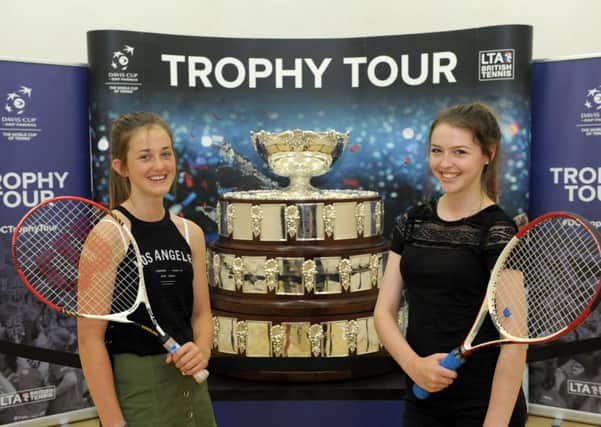 Carla Trainor, 13, left, and Isabella Jones, 15 with the Davis Cup at The Avenue Lawn Tennis, Squash and Fitness Club in Havant Picture: Paul Jacobs (160165-30)