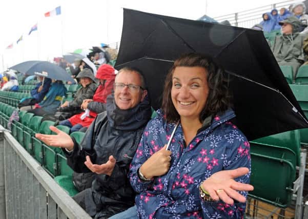 Andy and Rachel Wilkinson from Chichester watch the practice races at last year's America's Cup