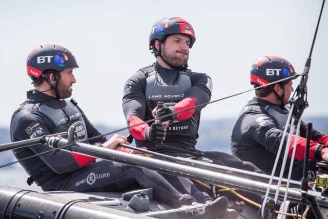 Paul Campbell-James, centre, and Sir Ben Ainslie, left. Picture: Harry KH/Land Rover BAR