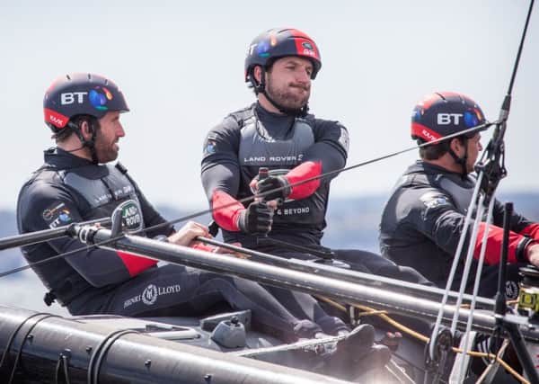 Paul Campbell-James, centre, and Sir Ben Ainslie, left. Picture: Harry KH/Land Rover BAR