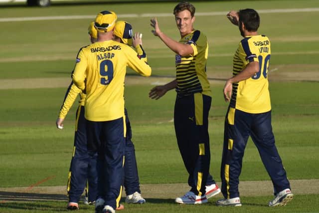 Brad Wheal celebrates one of his three wickets against Middlesex. Picture: Neil Marshall