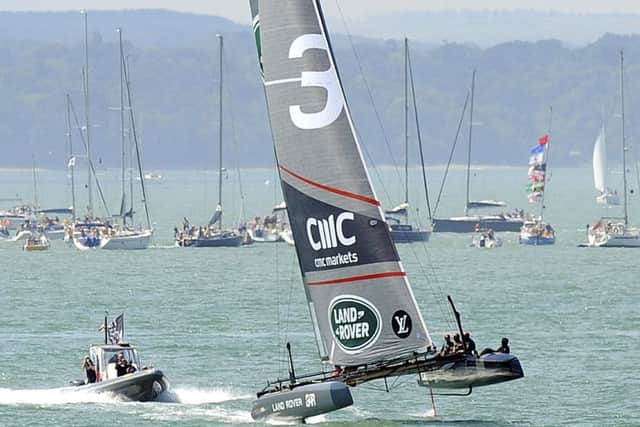 AMERICA'S CUP SATURDAY MRW 23/7/2016
The B.A.R.boat gets up on its foils in front of the large crowd off Southsea seafront at Saturday's America's Cup event as they prepare to get ready for the First Race
Picture by: Malcolm Wells (160723-8431)
Professional Photographer
Mobile: 07802 217 569
E: malcolmrichardwells@gmail.com PPP-160723-132557006