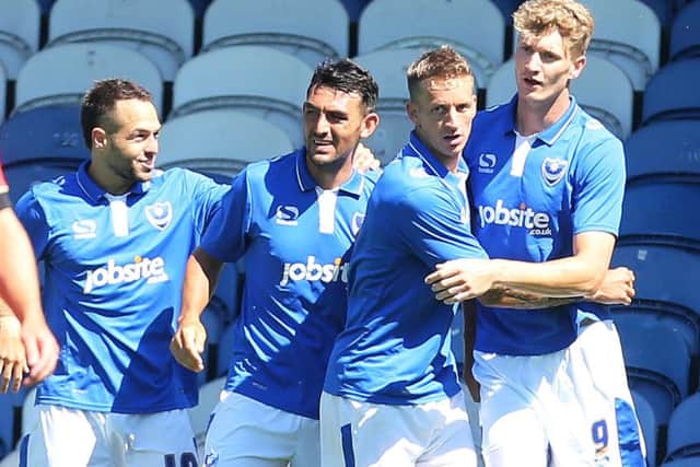 Michael Smith, right, is congratulated for his goal in the 3-3 draw with Bournemouth Picture: Joe Pepler