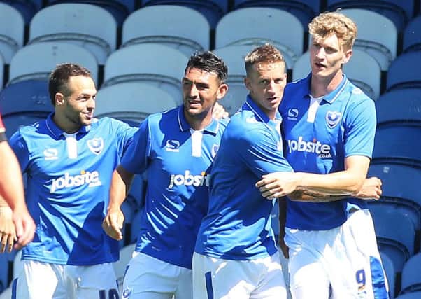 Michael Smith, right, is congratulated for his goal in the 3-3 draw with Bournemouth Picture: Joe Pepler