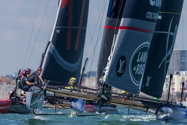 Sir Ben Ainslie and his Land Rover BAR crew lead the fleet in the America's Cup Wold Series Portsmouth event. Picture: Christopher Ison/PA Wire